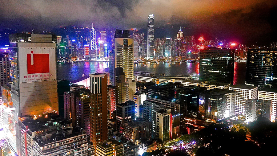 Enjoying a drink on a skyscraper's balcony bar with this incredible views