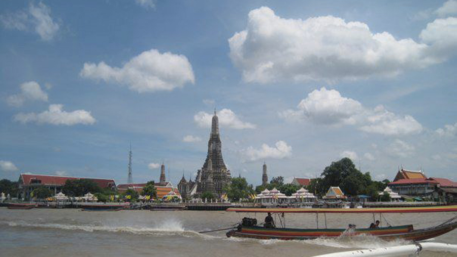Taking a boat to the impressive Wat Arun